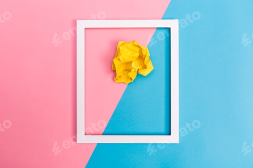 Preview: Crumpled Paper Ball With Frame On A Bright Split Tone Background