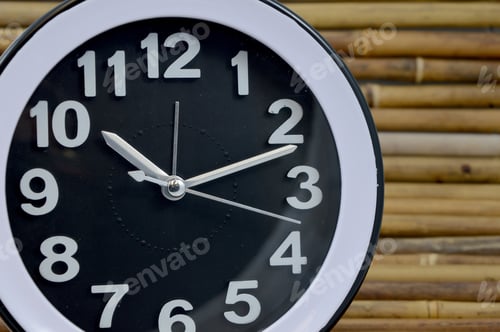 Preview: Closeup View Of A Modern Clockface For Telling The Time.