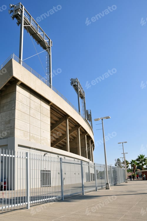 Preview: Banks Of Floodlights Supported On Steel Frames, College Football Stadium