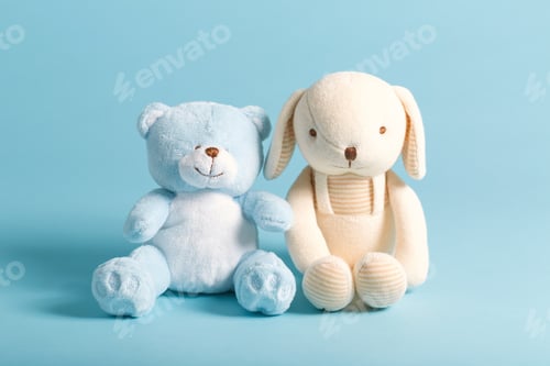 Preview: Baby'S Stuffed Animal Toys On A Blue Background