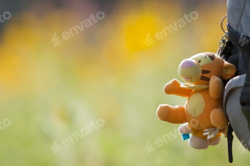 Preview: Toy Tiger Against Yellow Green Background