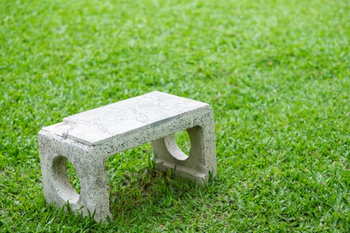 Preview: Old Marble Chair On Green Grass.