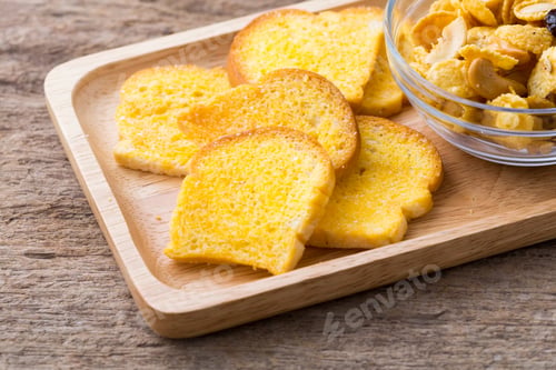 Preview: Slices Of Fresh Baked Bread,Bread Crisp With Corn Flakes On Wooden Table