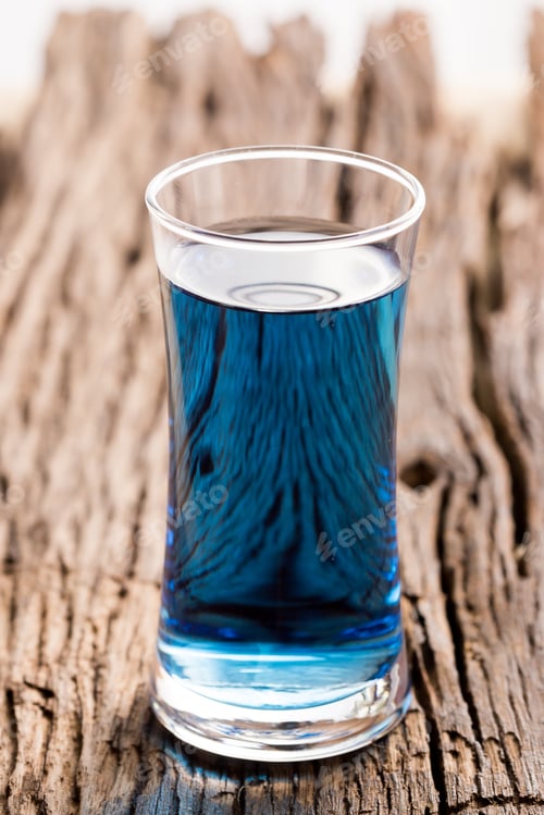 Preview: Blue Soft Drink On Wooden Table,Blue Water On Wooden Background