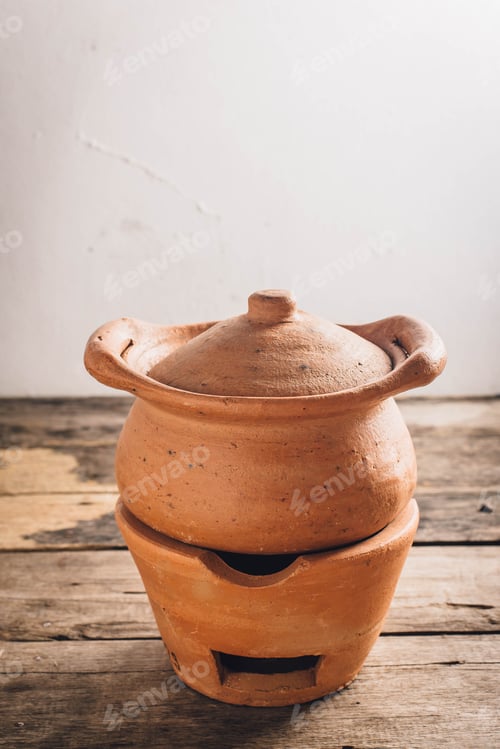 Preview: Clay Pot On Wooden Floor