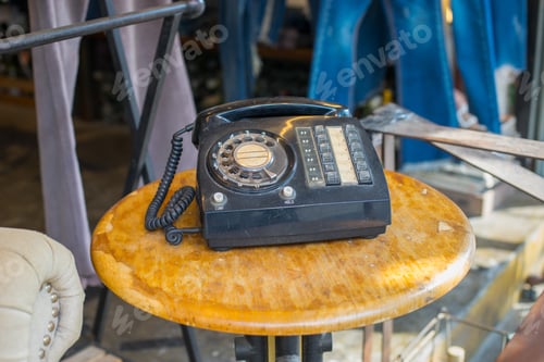 Preview: Aged Vintage Phone On A Wooden Table