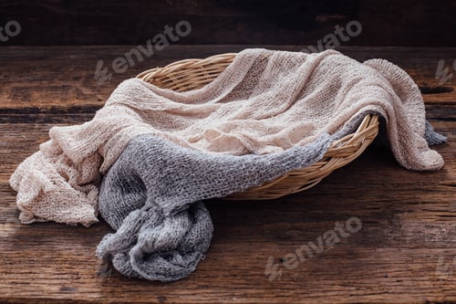 Vista previa: Towel In The Basket On Wooden Table Background