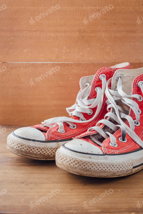 Preview: Red Sneakers On Wooden Background