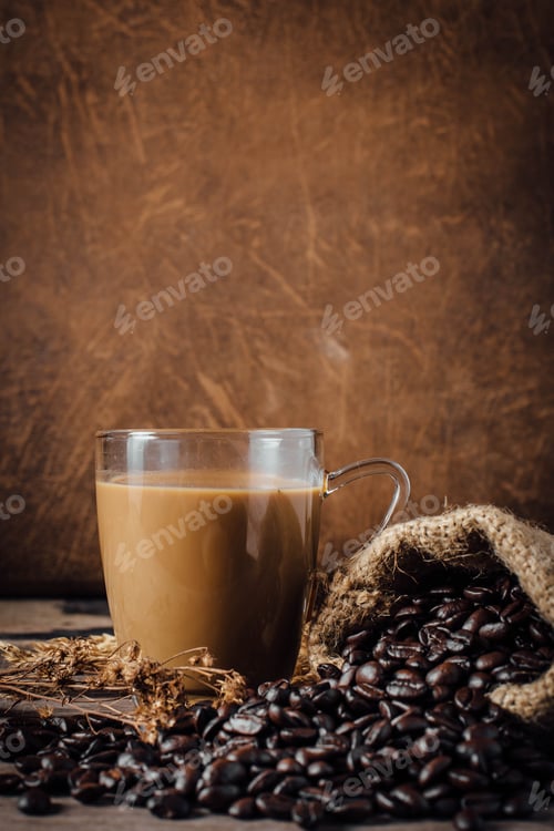 Preview: Cup Coffee And Coffee Beans On Wooden Floor With Brown Leather Background