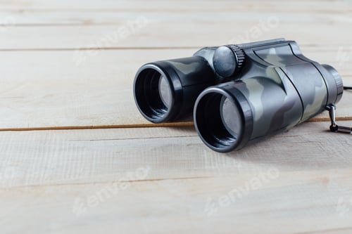 Preview: Binoculars On Wooden
