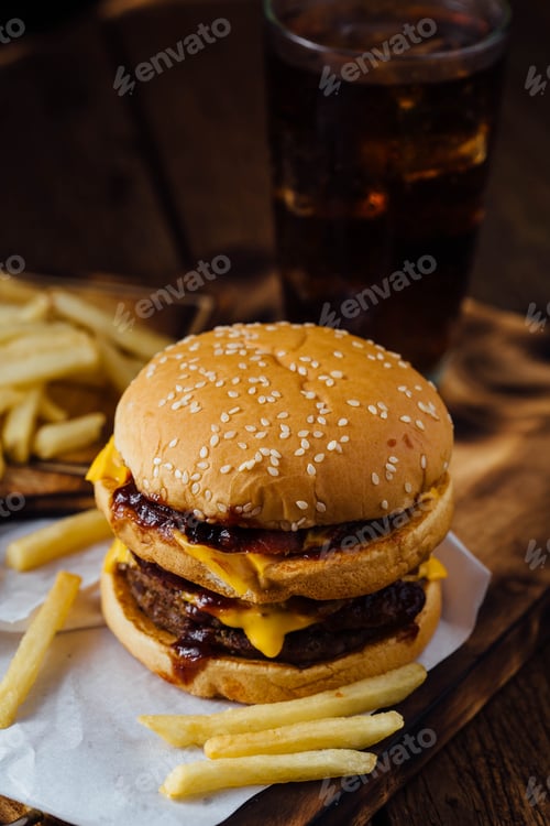 Preview: Junk Food With Burger And French Fries On Wooden Table Background