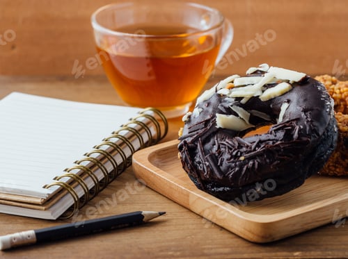 Preview: Delicious Doughnut with Tea and Notebook