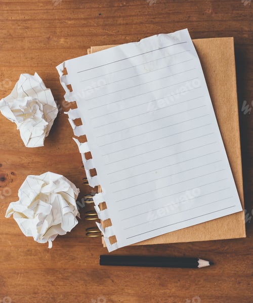 Preview: Note Book And Pencil With Crumpled Paper On Wooden Background