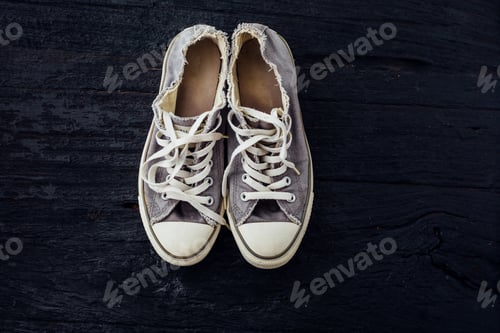Preview: Gray Sneaker On Black Table Background