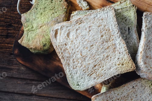 Preview: Moldy Bread On Wooden Table Background