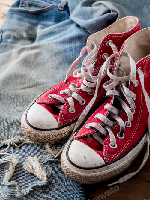 Preview: Red Sneakers On Old Jeans
