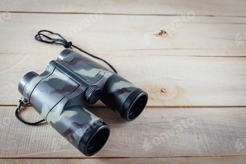 Preview: Binoculars On Wooden