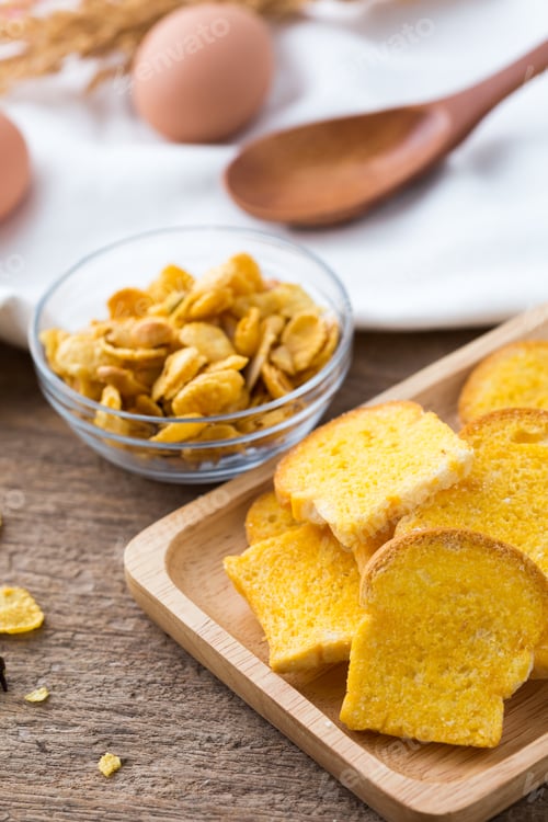 Preview: Slices Of Fresh Baked Bread,Bread Crisp With Corn Flakes On Wooden Table