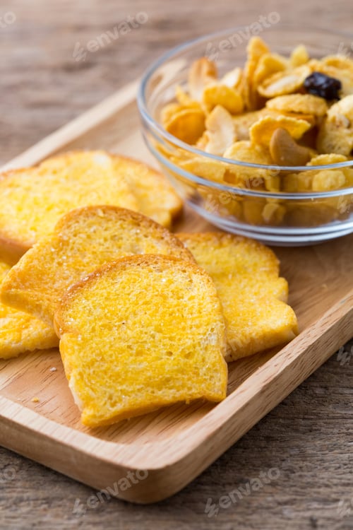 Preview: Slices Of Fresh Baked Bread,Bread Crisp With Corn Flakes On Wooden Table