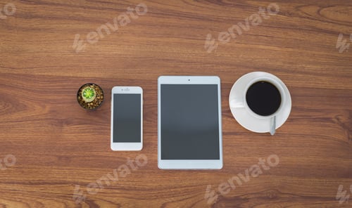 Preview: Office Table With Notepad, Coffee Cup , Smartphone,Tablet View From Above With Copy Space