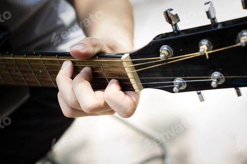 Preview: Man Playing Classic, Acoustic Guitar ,Chord On An Acoustic Guitar