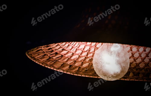 Preview: Light Bulb Against A Black Background