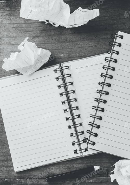 Preview: Note Book With Crumpled Paper On Wooden Background,Vintage Filter ,Monochrome