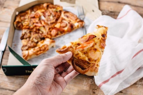 Preview: Pizza In Paper Box On Wooden Background