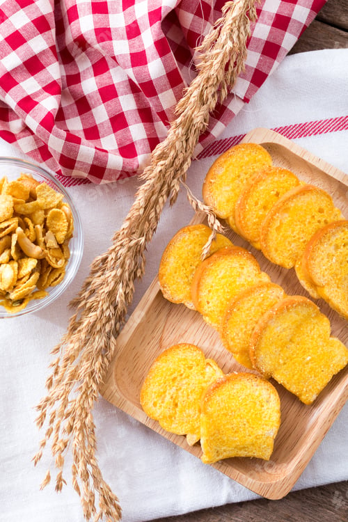 Preview: Slices Of Fresh Baked Bread,Bread Crisp With Corn Flakes On Wooden Table