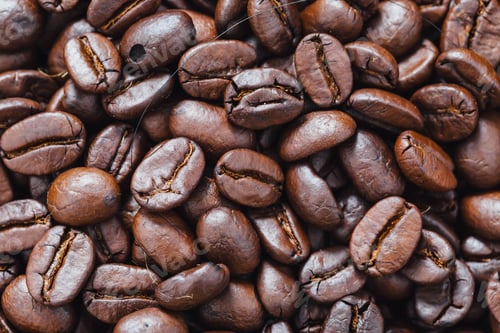 Preview: Coffee Beans On Wooden Table Background