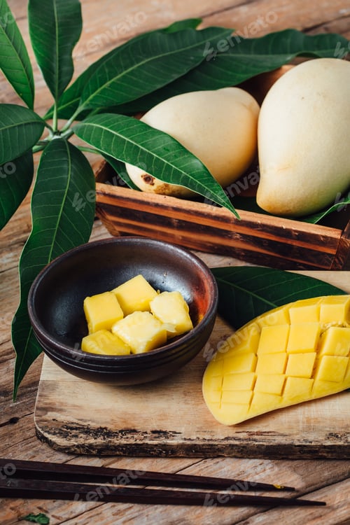 Preview: Mango On Wooden Background
