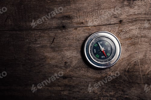 Preview: Compass On Wooden Background