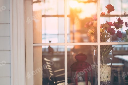 Preview: Colorful Decoration Artificial Flower In Window. Vintage Color.