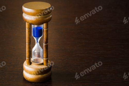 Preview: Hourglass Or Sand Glass On A Table