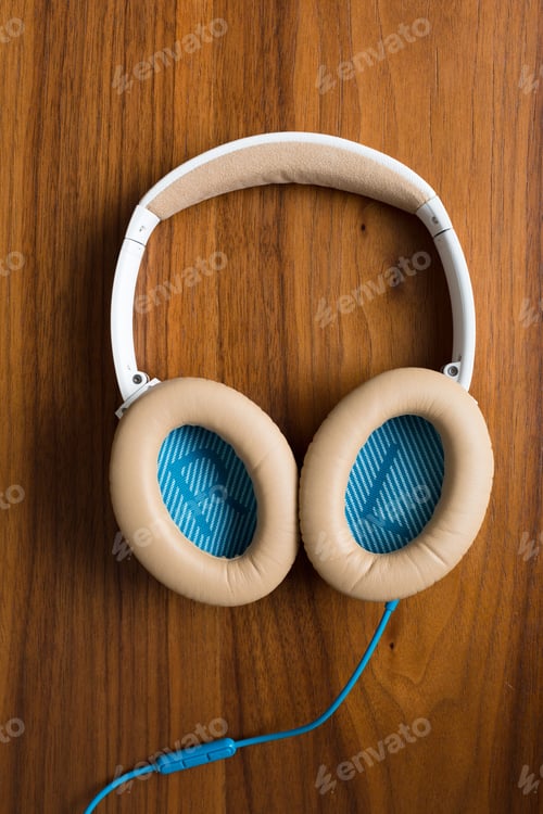 Preview: Travel Headphones On Wooden Brown Background