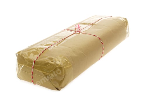 Preview: Parcel Wrapped With Brown Kraft Paper Isolated On White Background.