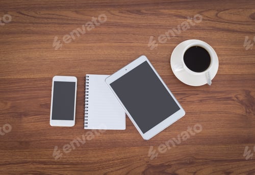 Preview: Office Table With Notepad, Coffee Cup , Pencil,Smartphone,Tablet View From Above With Copy Space