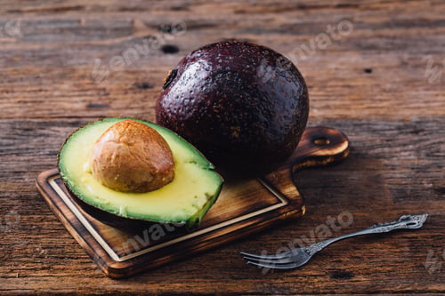 Preview: Avocado On Wooden Table Background