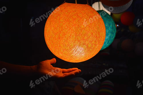Preview: Holding A Traditional Lao Woven Lamp Sold At The Night Market Of Luang Prabang, Laos