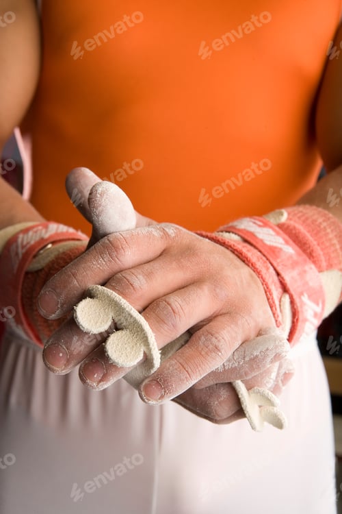 Preview: Detail Of Male Gymnast About To Perform Covering Hands In Chalk