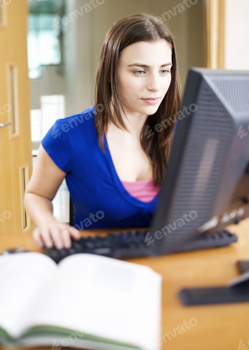 Preview: A Teenage Girl Using A Computer
