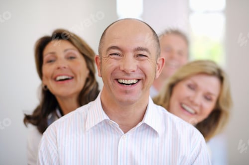 Preview: Portrait Of Smiling Mature Man At Home With Friends