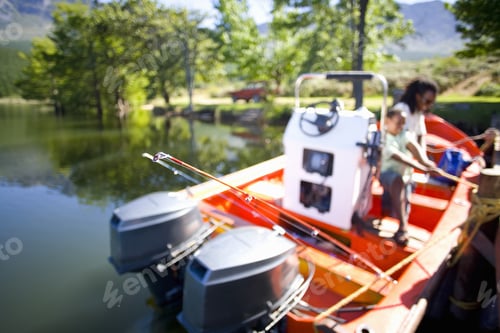Preview: Father And Son Boating On Lake