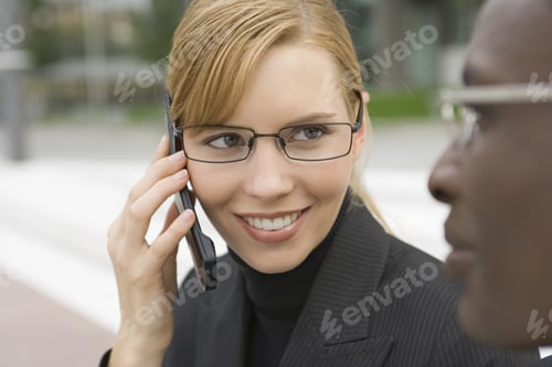 Preview: A Businesswoman Talking On Her Phone.