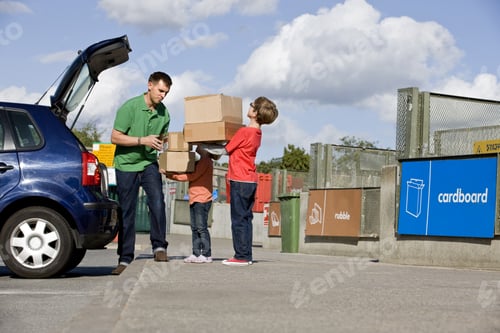 Preview: A Father And Children Recycling Cardboard Boxes