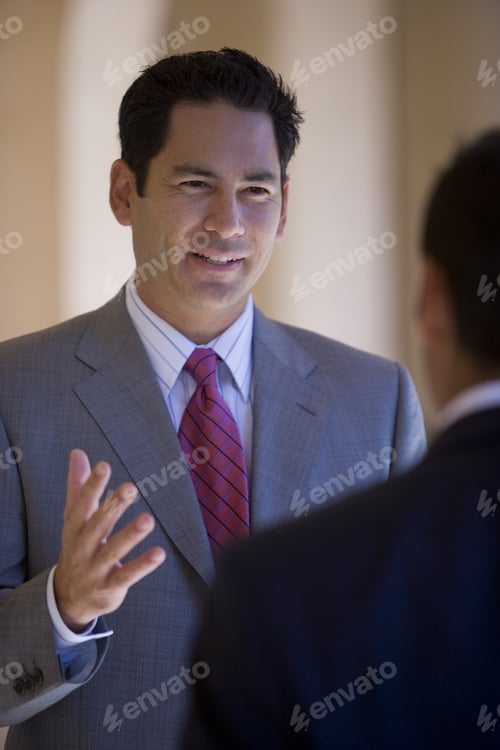 Preview: Two Businessmen Talking