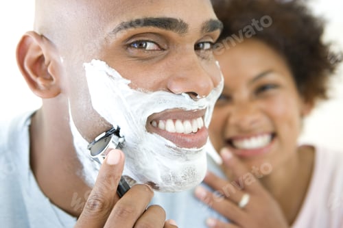 Preview: Young Woman Smiling At Man Shaving, Portrait Of Man, Close-Up