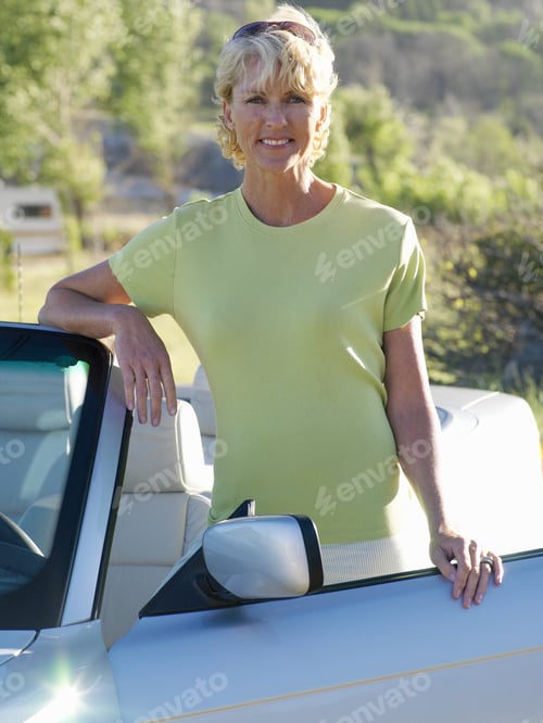 Preview: Mature Woman By Convertible Car, Smiling, Portrait