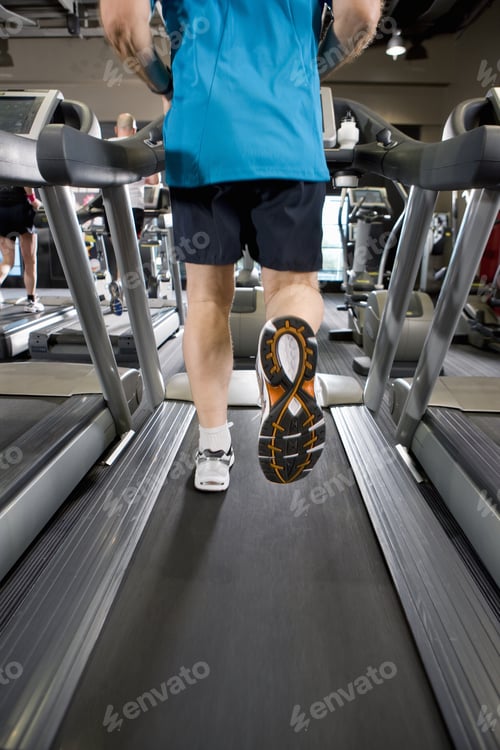 Preview: Man Running On Treadmill In Health Club