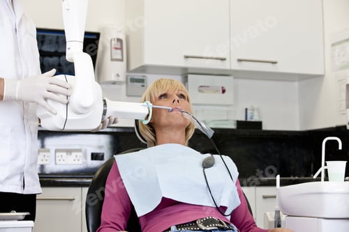 Preview: A Female Patient Having An X-Ray At The Dentist